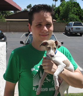 Picture of Bryan holding his dog twinkie